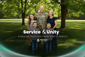 A smiling family of five, including a man in military uniform, stands together in a sunny park. The text reads: “Service & Unity: A Healing Path for Those Who’ve Served. Behavioral health in Nashville TN—Provive Wellness.”.
